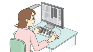 パソコンで仕事をしているデザイナーの絵